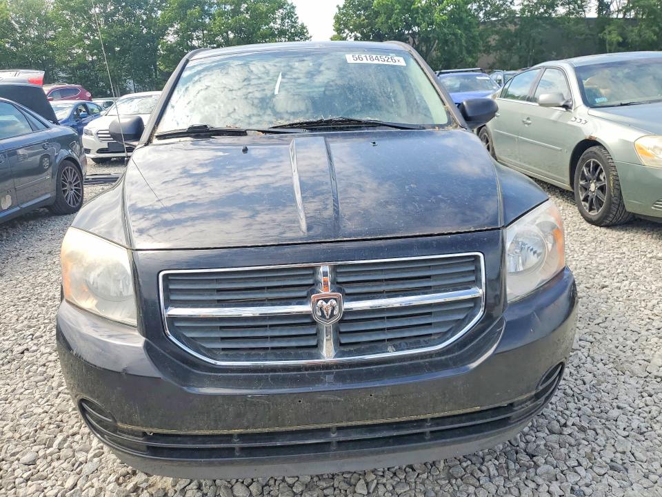 2009 Dodge Caliber VIN 1B3HB48AX9D171170 COPART salvage auction — NORMAL WEAR, Ma - Certificate Of Title, sold $425 on 2026-07-23 (photo 5)