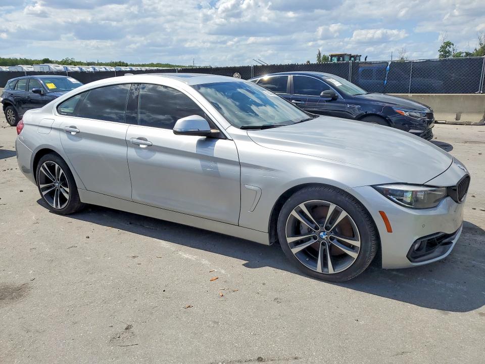 2020 BMW VIN WBA4J5C04LCD24580 COPART salvage auction — WATER/FLOOD, In - Certificate Of Title, sold $8,400 on 2026-07-28 (photo 4)