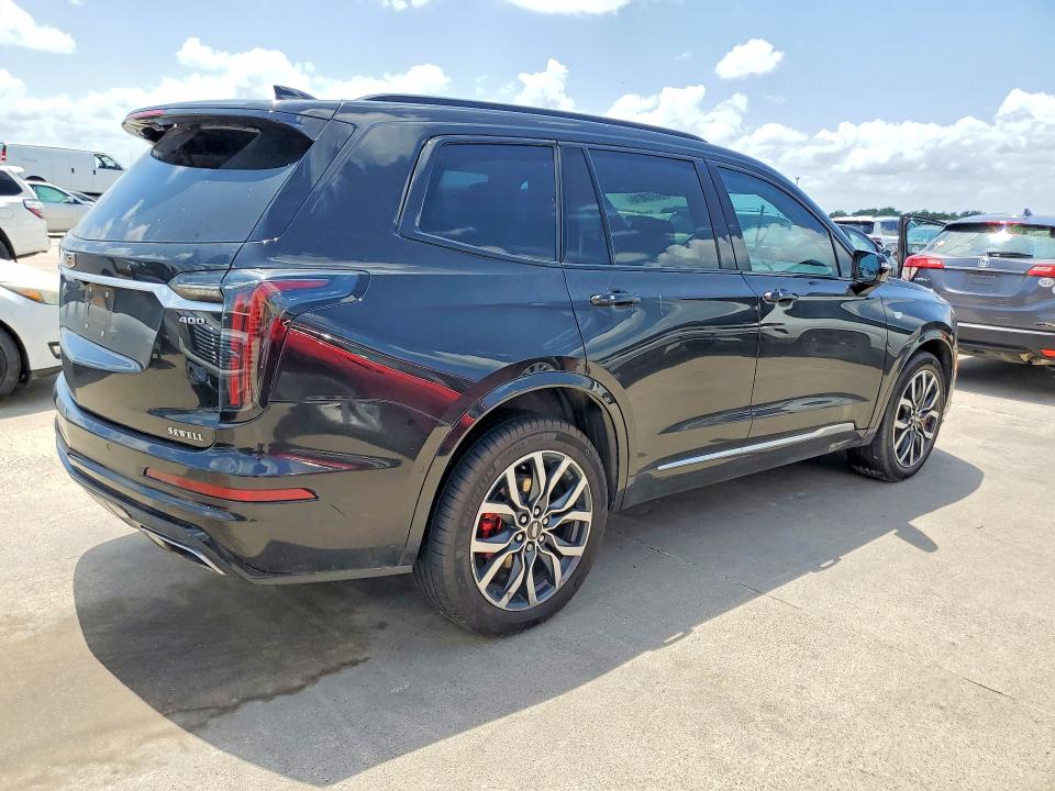 2023 Cadillac Xt6 VIN 1GYKPGRS0PZ141748 COPART salvage auction — WATER/FLOOD, Salvage Title, sold $9,000 on 2026-07-30 (photo 3)