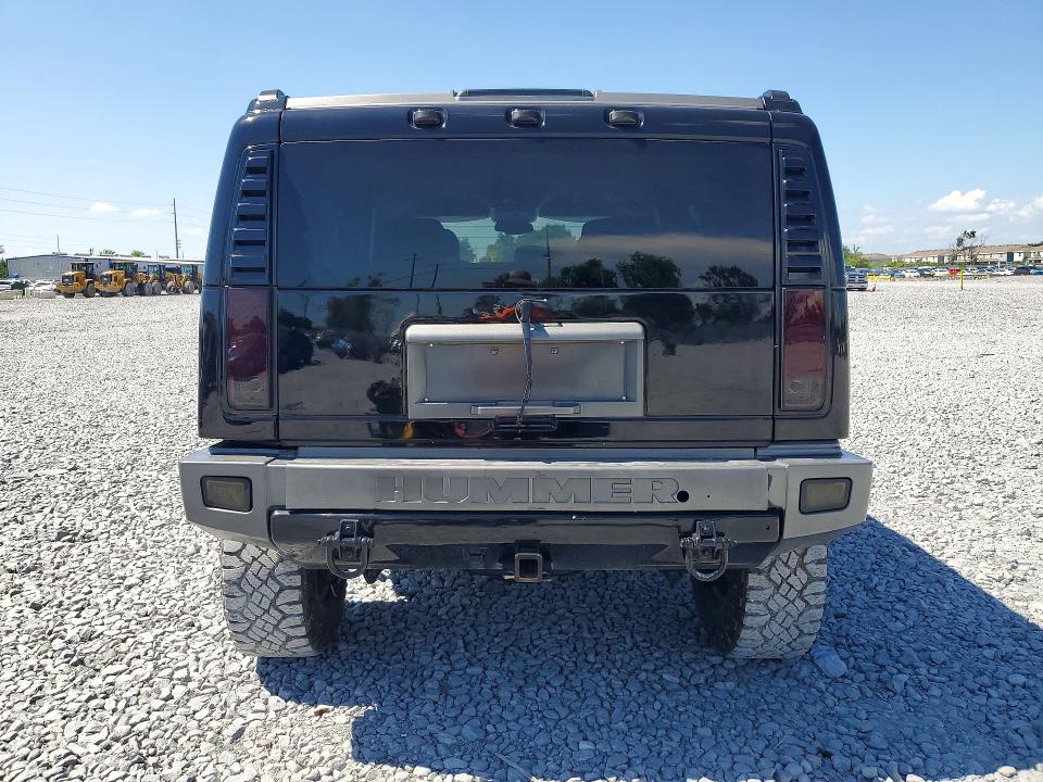 2003 Hummer H2 VIN 5GRGN23U03H120685 COPART salvage auction — MINOR DENT/SCRATCHES, Fl - Cert Of Title-Rebuilt, sold $1,650 on 2026-07-31 (photo 6)
