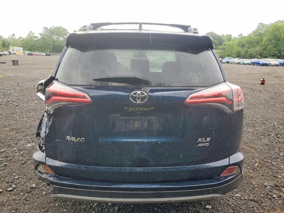 2018 Toyota Rav 4 VIN JTMRFREV0JJ217980 COPART salvage auction — REAR END, NY - MV-907A SALVAGE CERTIFICATE, sold $5,700 on 2026-07-28 (photo 6)
