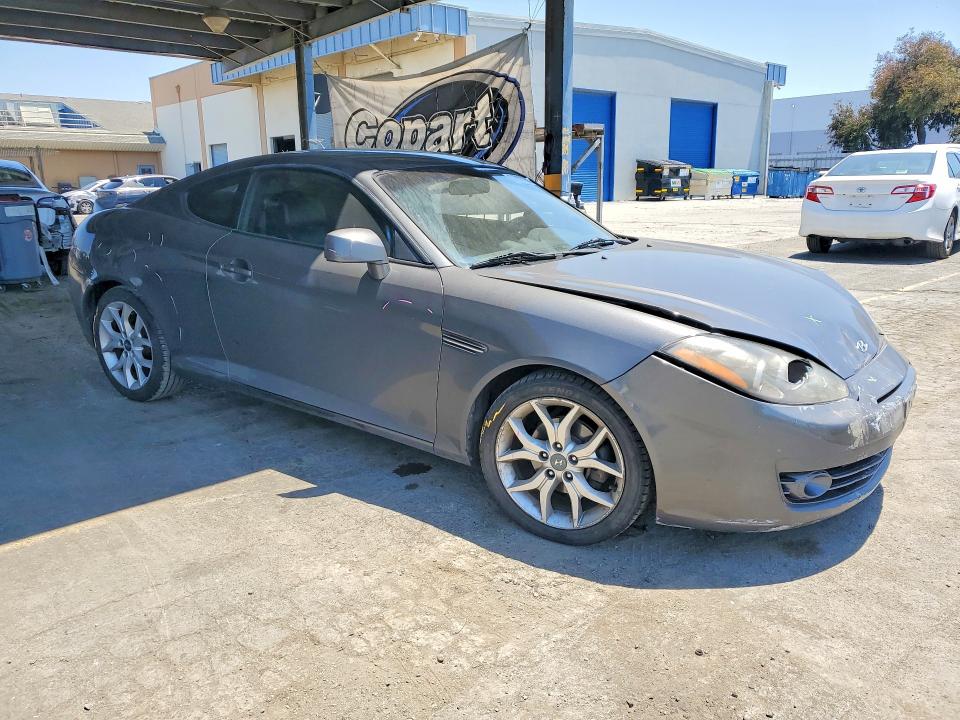 2007 Hyundai Tiburon VIN KMHHN66F77U237425 COPART salvage auction — FRONT END, Ca - Salvage Certificate, sold $150 on 2026-07-30 (photo 4)