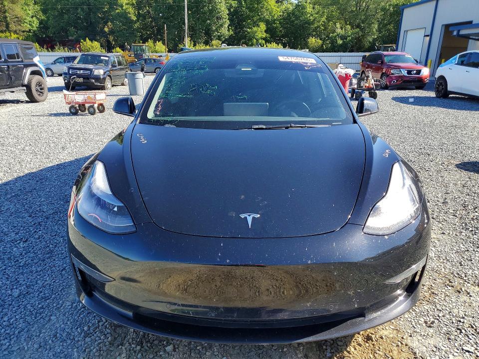 2022 Tesla Model 3 VIN 5YJ3E1EB6NF272897 COPART salvage auction — SIDE, Nc - Salvage Certificate Of Title, sold $5,700 on 2026-07-23 (photo 5)