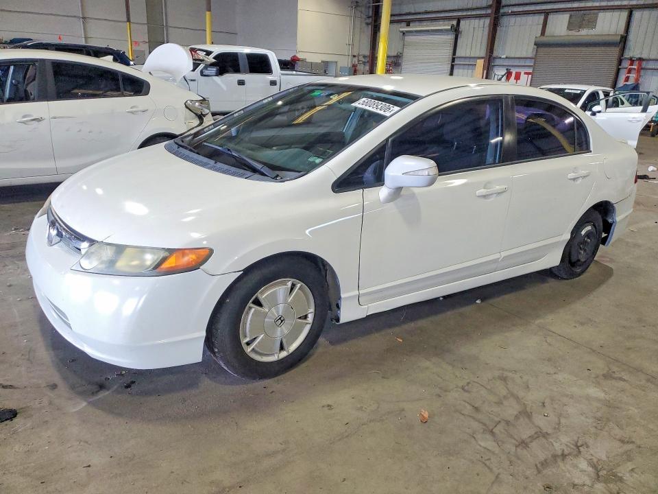 2010 Honda Civic hybrid VIN JHMFA3F22AS007411 COPART salvage auction — MECHANICAL, Fl - Cert Of Title Slvg Rebuildable, sold $400 on 2026-07-13 (photo 1)