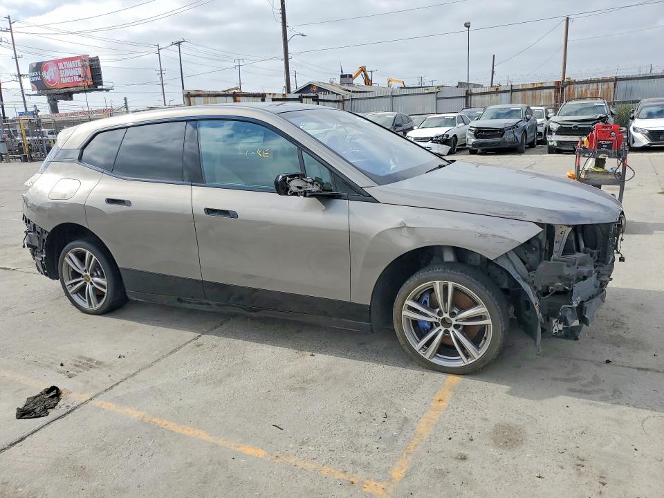 2024 BMW Ix VIN WB523CF03RCR15800 COPART salvage auction — STRIPPED, Ca - Dis/Dlr/Exp Only Clean Title, sold $19,400 on 2026-07-17 (photo 4)