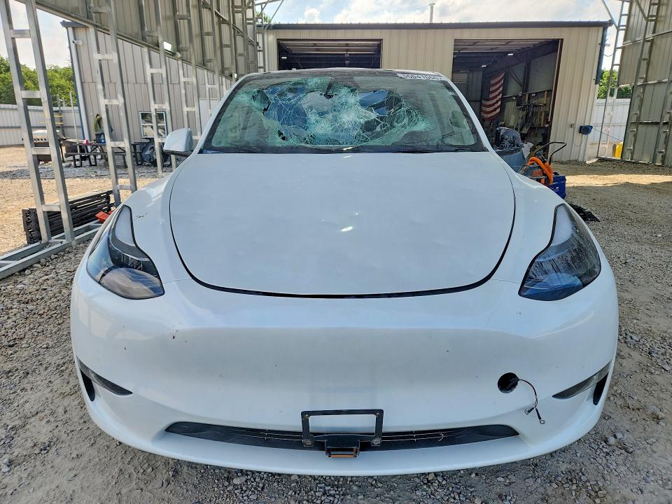 2023 Tesla Model y VIN 7SAYGDEE3PA207780 COPART salvage auction — HAIL, MO - SALVAGE CERTIFICATE OF TITLE, sold $12,800 on 2026-07-27 (photo 5)