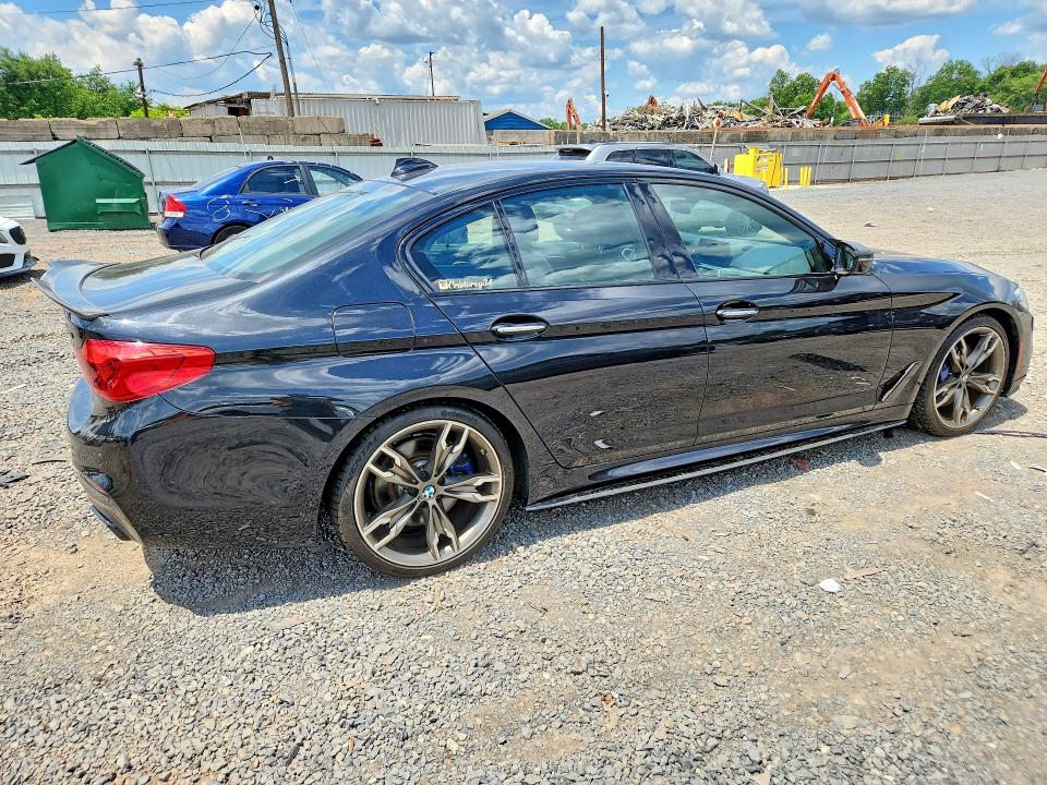 2018 BMW M550i xdrive VIN WBAJB9C58JB035348 COPART salvage auction — SIDE, RI - CERTIFICATE OF TITLE, sold $11,500 on 2026-07-16 (photo 3)
