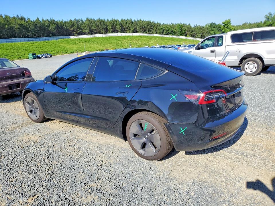 2022 Tesla Model 3 VIN 5YJ3E1EB6NF272897 COPART salvage auction — SIDE, Nc - Salvage Certificate Of Title, sold $5,700 on 2026-07-23 (photo 2)
