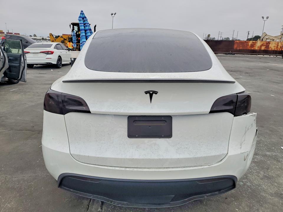 2023 Tesla Model y VIN 7SAYGDEFXPF917545 COPART salvage auction — FRONT END, Ca - Salvage Certificate, sold $10,500 on 2026-07-02 (photo 6)