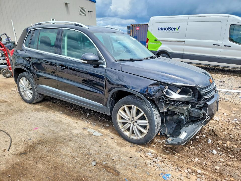 2014 Volkswagen Tiguan VIN WVGBV3AX1EW541890 COPART salvage auction — FRONT END, Wi - Certificate Of Title, sold $1,050 on 2026-08-03 (photo 4)
