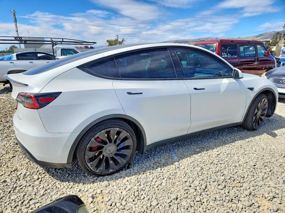 2022 Tesla Model y VIN 7SAYGDEF9NF411282 COPART salvage auction — UNDERCARRIAGE, Salvage Title, sold $11,300 on 2026-07-16 (photo 3)