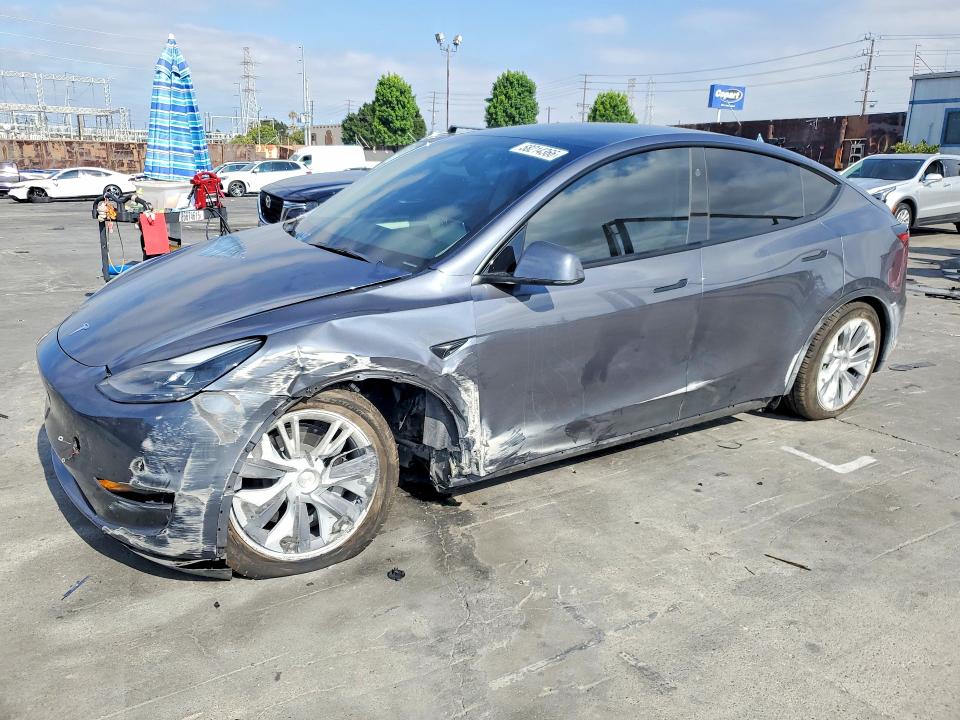 2023 Tesla Model y VIN 7SAYGDEE0PF925676 COPART salvage auction — FRONT END, Ca - Salvage Certificate, sold $9,400 on 2026-07-02 (photo 1)