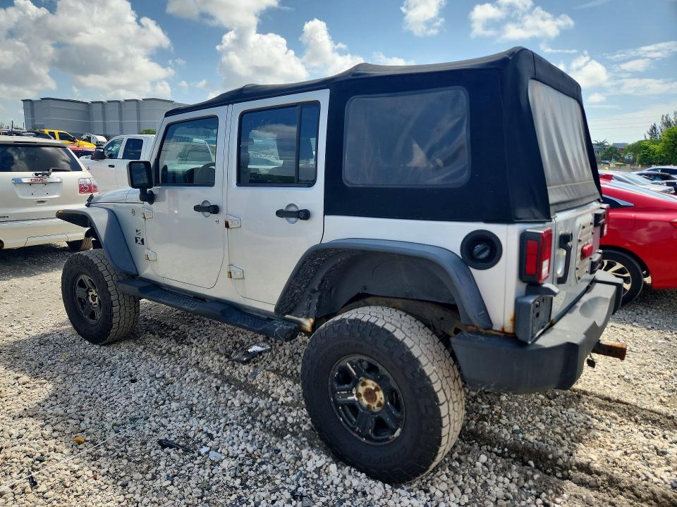 2007 Jeep Wrangler / VIN 1J4GA39197L140348 COPART salvage auction — MINOR DENT/SCRATCHES, Me - Certificate Of Title, sold $2,100 on 2026-07-02 (photo 2)