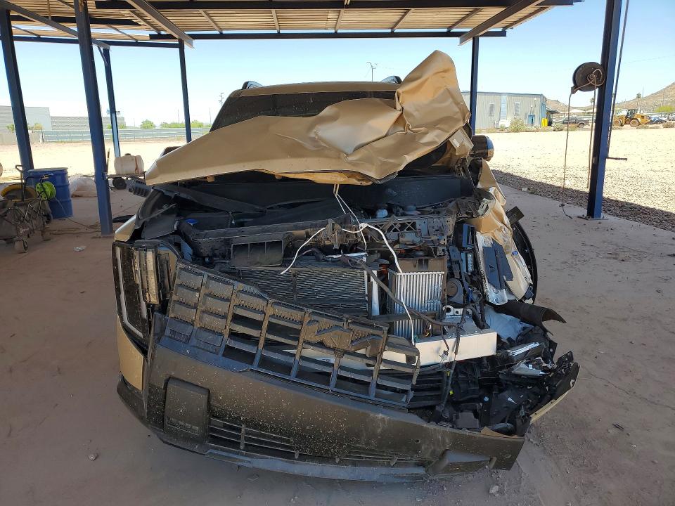 2027 Kia Telluride VIN 5XYPDESA2VG005658 COPART salvage auction — FRONT END, AZ - CERT OF TITLE - SALVAGE, sold $21,300 on 2026-07-14 (photo 5)