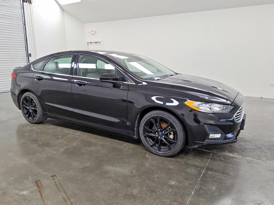 2019 Ford Fusion VIN 3FA6P0HD6KR147915 COPART salvage auction — MINOR DENT/SCRATCHES, Tx - Certificate Of Title, sold $2,850 on 2026-07-02 (photo 4)
