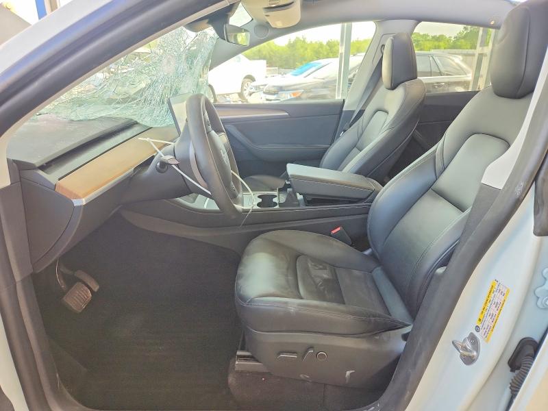 2023 Tesla Model y VIN 7SAYGDEE3PA207780 COPART salvage auction — HAIL, MO - SALVAGE CERTIFICATE OF TITLE, sold $12,800 on 2026-07-27 (photo 7)