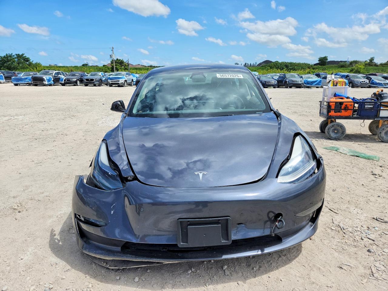 2023 Tesla Model 3 VIN 5YJ3E1EA7PF697474 COPART salvage auction — Side, MD - CERTIFICATE OF TITLE, sold $5,900 on 2026-07-03 (photo 5)