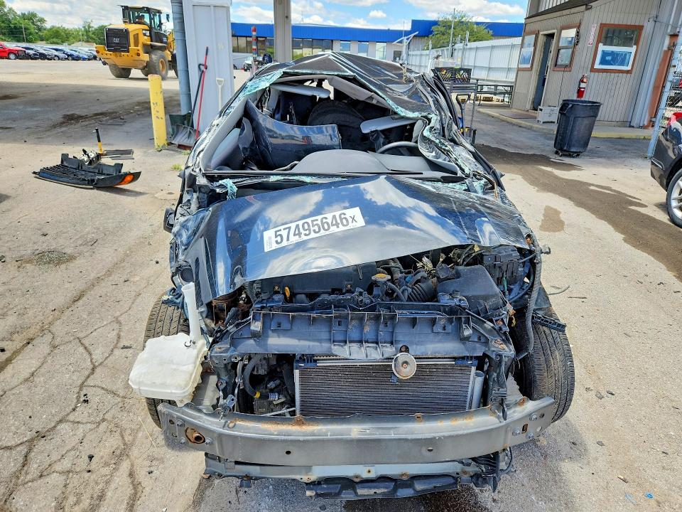 2009 Toyota Yaris VIN JTDJT903295233856 COPART salvage auction — ALL OVER, IN - CERT OF TITLE-SALVAGE TITLE (P), sold $225 on 2026-07-27 (photo 5)