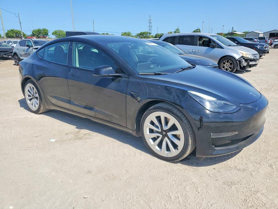 2022 Tesla Model 3 VIN 5YJ3E1EA6NF372439 COPART salvage auction — REAR END, Fl - Certificate Of Title, sold $15,700 on 2026-07-06 (photo 4)