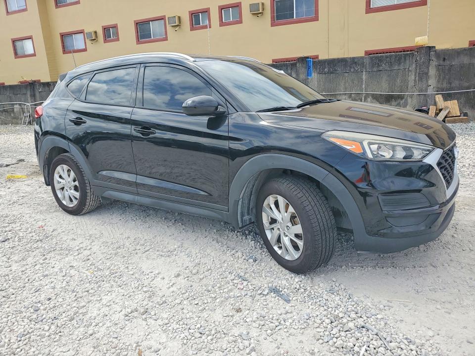 2021 Hyundai Tucson VIN KM8J33A42MU310126 COPART salvage auction — WATER/FLOOD, Fl - Cert Of Title-Slvg Rebld Flood, sold $4,450 on 2026-07-31 (photo 4)