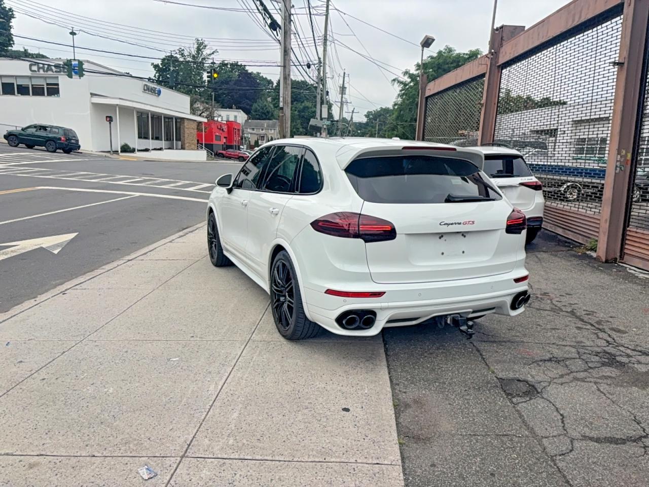 2016 Porsche Cayenne VIN WP1AD2A21GLA79142 COPART salvage auction — Normal Wear, NY - CERT OF TITLE-REBUILT SALVAGE (P), sold $1,500 on 2026-06-30 (photo 3)