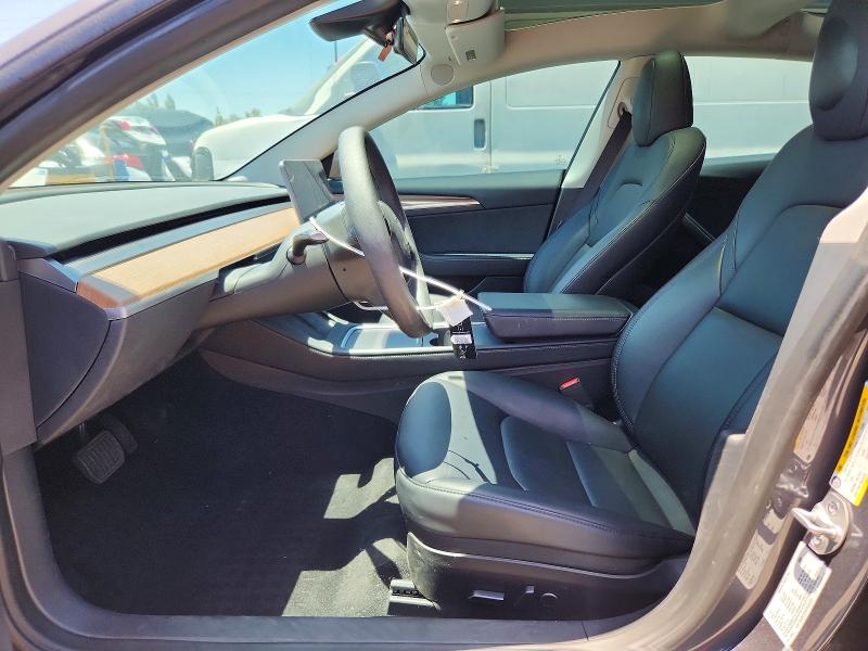 2023 Tesla Model 3 VIN 5YJ3E1EA8PF692056 COPART salvage auction — REAR END, Ca - Salvage Certificate, sold $7,700 on 2026-07-16 (photo 7)