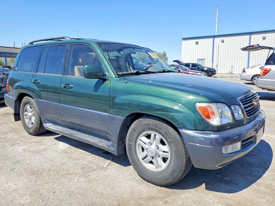 2000 Lexus Lx VIN JT6HT00W3Y0106704 COPART salvage auction — ROLLOVER, NV - SALVAGE TITLE, sold $200 on 2026-07-21 (photo 4)