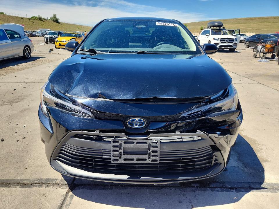 2023 Toyota Corolla VIN JTDBCMFE6P3010597 COPART salvage auction — FRONT END, Fl - Certificate Of Destruction, sold $5,400 on 2026-07-27 (photo 5)