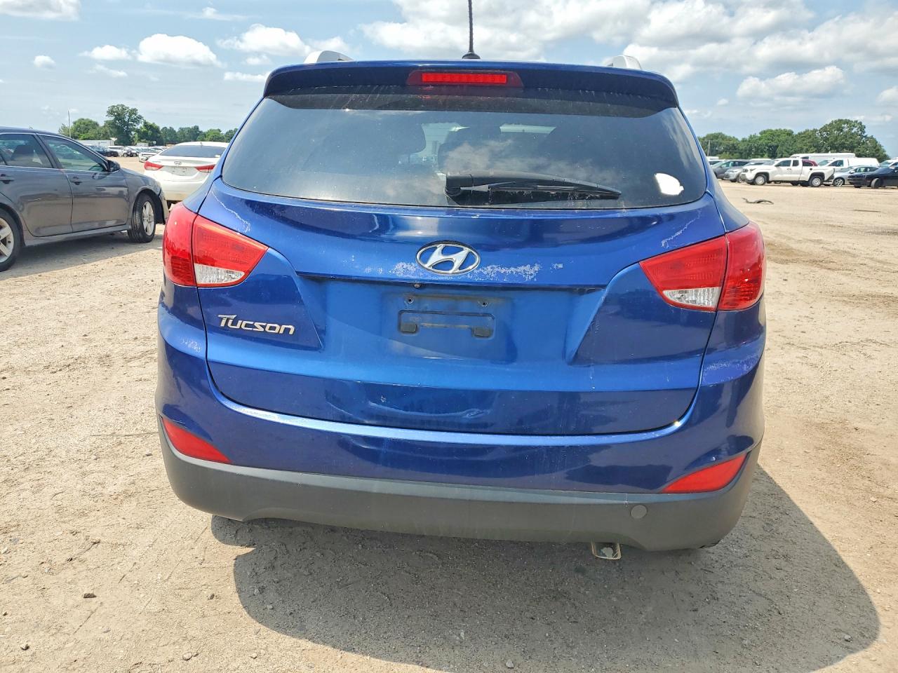 2014 Hyundai Tucson VIN KM8JU3AG2EU799930 COPART salvage auction — Side, AL - CERT OF TITLE-SALVAGE TITLE, sold $1,100 on 2026-07-02 (photo 6)