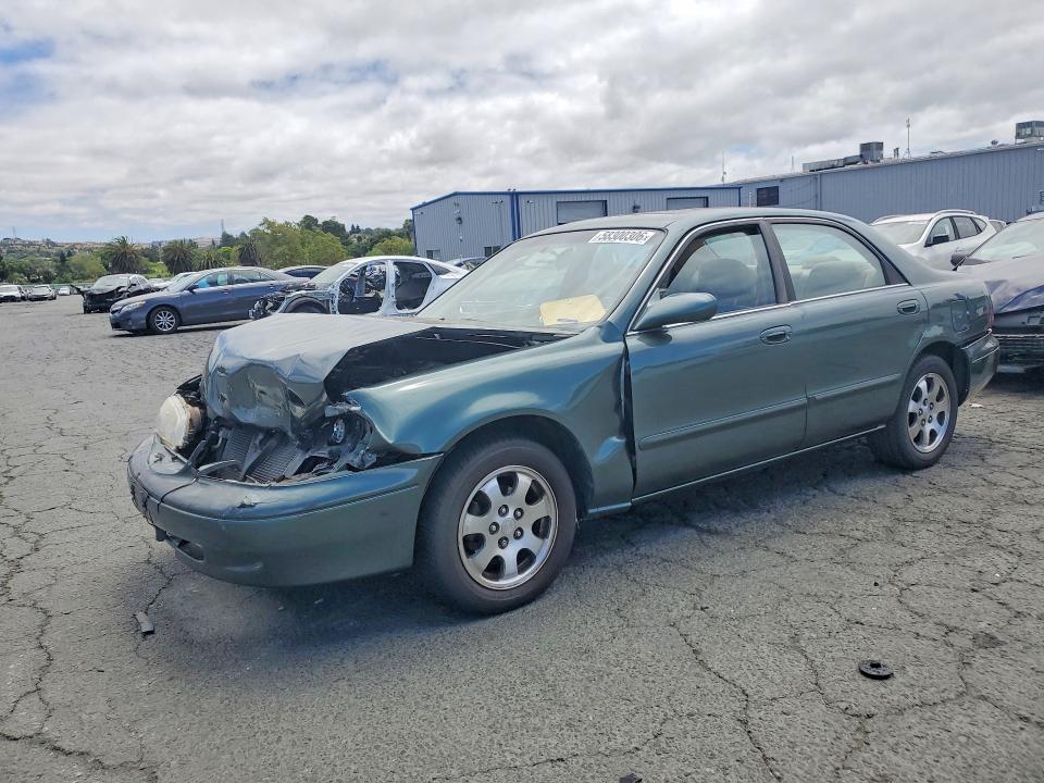 1999 Mazda 626 VIN 1YVGF22C3X5853466 — COPART salvage auction photo