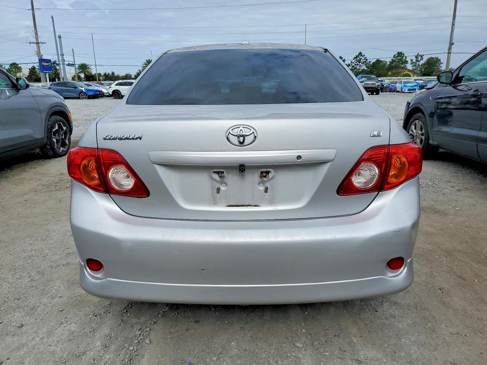 2009 Toyota Corolla VIN JTDBL40E099052336 COPART salvage auction — FRONT END, Fl - Cert Of Title Slvg Rebuildable, sold $675 on 2026-07-24 (photo 6)