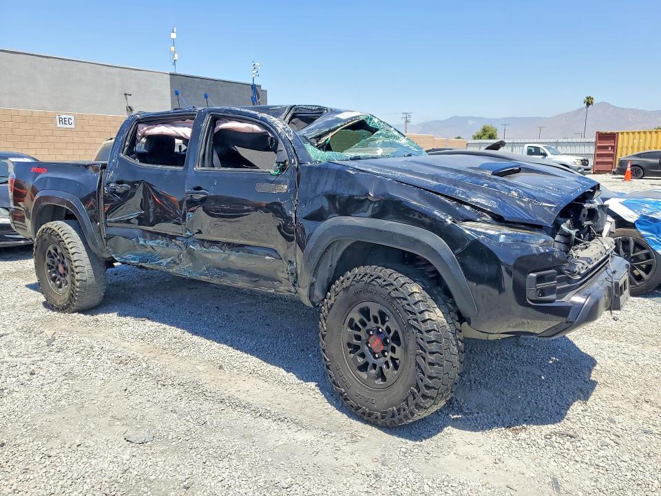 2019 Toyota Tacoma VIN 5TFCZ5AN2KX207929 COPART salvage auction — ROLLOVER, CA - SALVAGE CERTIFICATE, sold $5,900 on 2026-07-22 (photo 4)