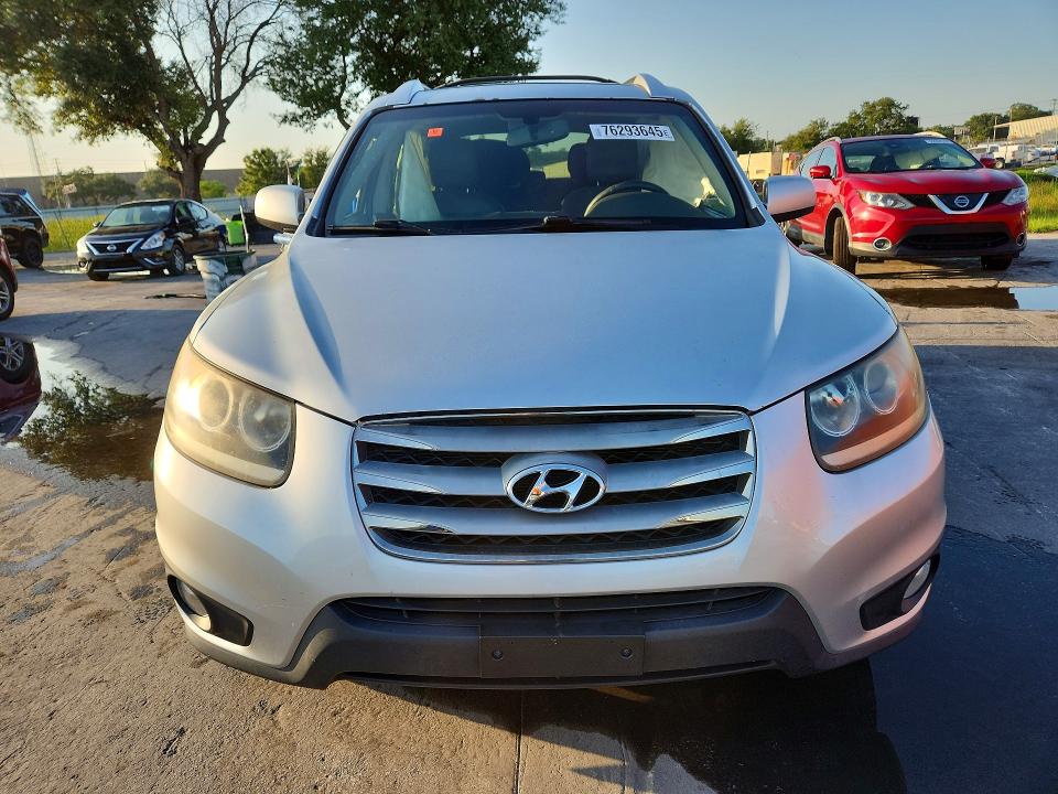 2012 Hyundai Santa fe VIN 5XYZK3ABXCG128084 COPART salvage auction — SIDE, Fl - Cert Of Title Slvg Rebuildable, sold $1,150 on 2026-07-16 (photo 5)