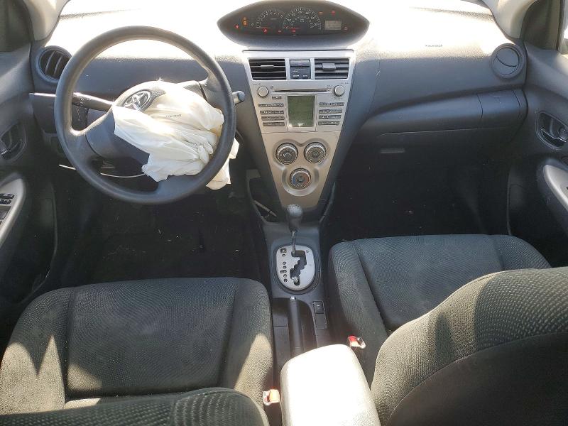2010 Toyota Yaris VIN JTDBT4K36A1360982 COPART salvage auction — FRONT END, Or - Salvage Title Certificate, sold $125 on 2026-07-29 (photo 8)