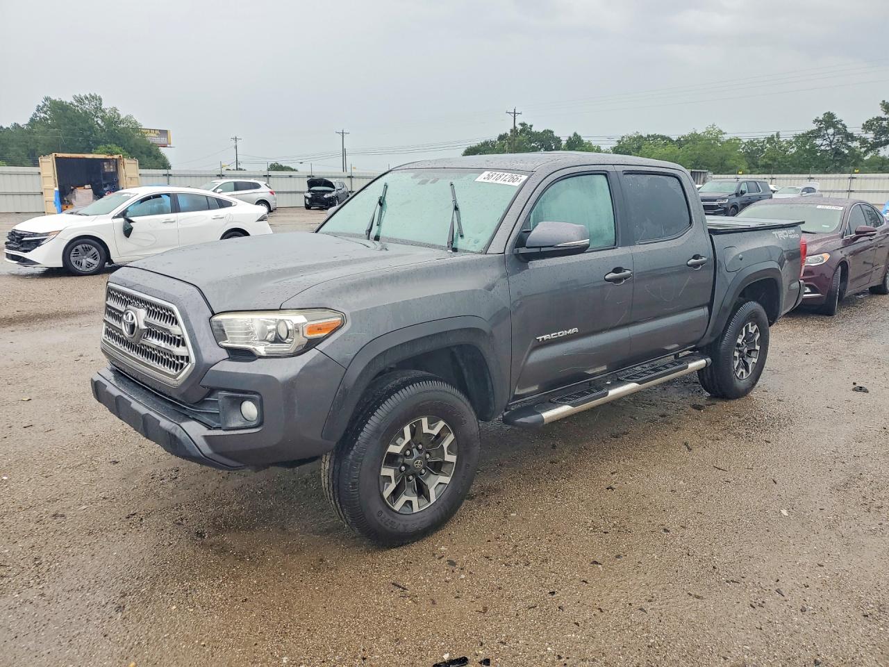 2016 Toyota Tacoma VIN 3TMAZ5CN3GM006414 COPART salvage auction — Top/Roof, FL - CERT OF TITLE SLVG REBUILDABLE, sold $10,300 on 2026-07-09 (photo 1)