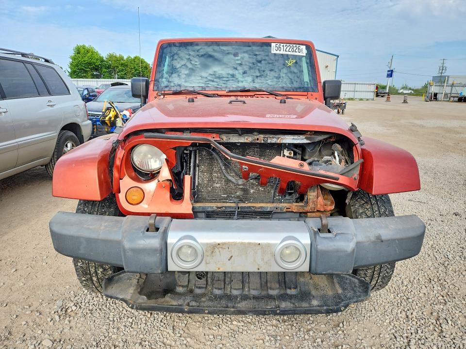 2009 Jeep Wrangler unlimited VIN 1J4GA59149L731962 COPART salvage auction — FRONT END, ON - PERMIT SALVAGE, sold $1,800 on 2026-07-28 (photo 5)