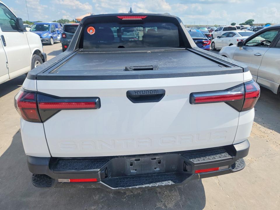 2024 Hyundai Santa cruz VIN 5NTJC4AE5RH086050 COPART salvage auction — REAR END, Tx - Salvage Vehicle Title, sold $500 on 2026-07-23 (photo 6)