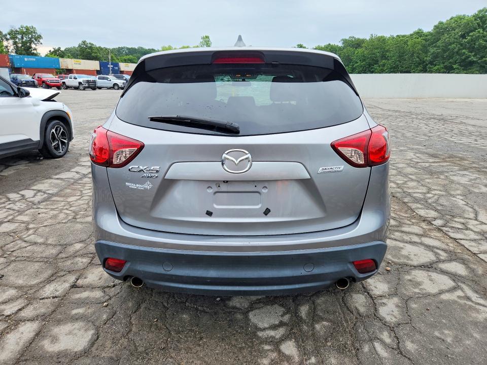 2014 Mazda VIN JM3KE4CY5E0329973 COPART salvage auction — HAIL, Mo - Salvage Certificate Of Title, sold $2,650 on 2026-07-20 (photo 6)