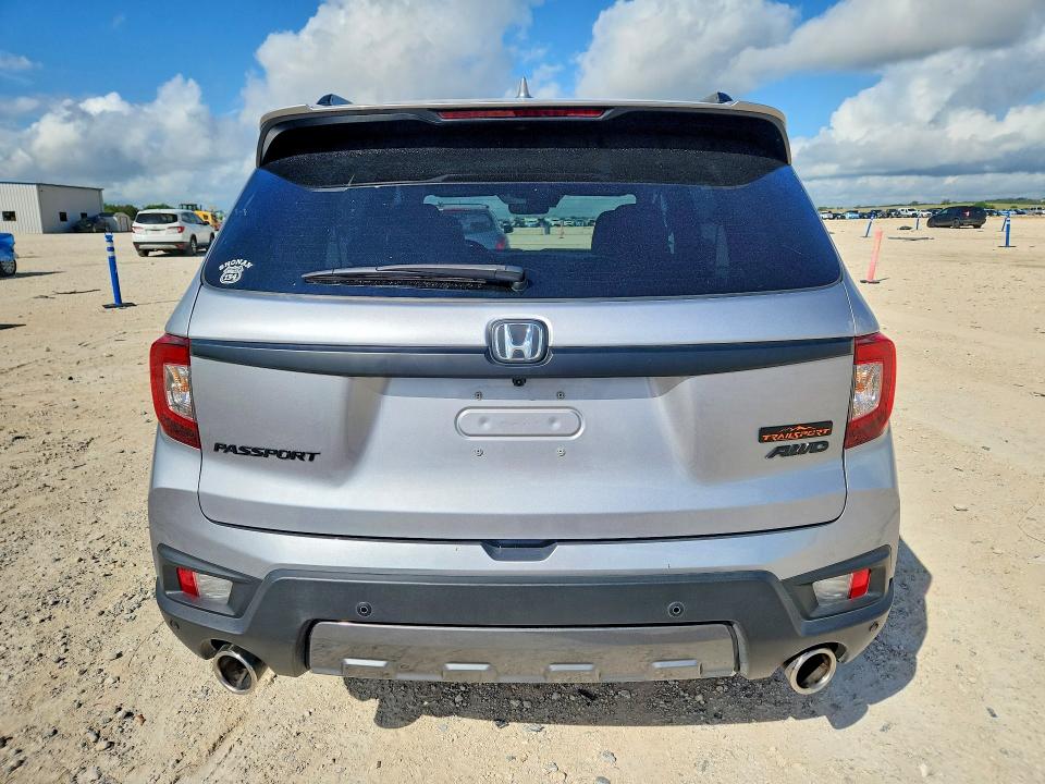 2023 Honda Passport VIN 5FNYF8H65PB028820 COPART salvage auction — SIDE, Tx - Salvage Vehicle Title, sold $14,000 on 2026-07-09 (photo 6)