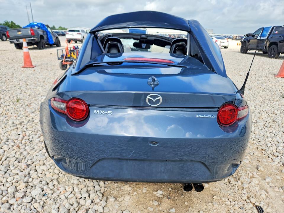 2021 Mazda Mx-5 miata VIN JM1NDAM72M0457924 COPART salvage auction — ALL OVER, Tx - Salvage Vehicle Title, sold $70 on 2026-07-30 (photo 6)