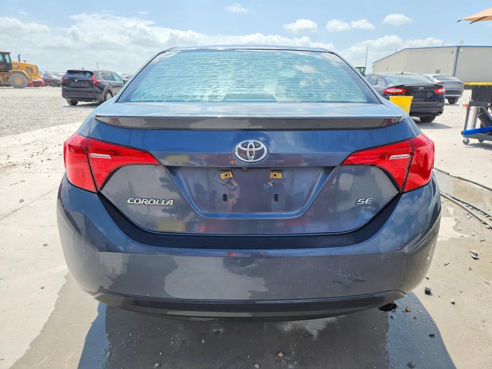 2018 Toyota Corolla VIN 5YFBURHE5JP816565 COPART salvage auction — WATER/FLOOD, TX - SALVAGE TITLE-FLOOD DAMAGE, sold $1,800 on 2026-07-24 (photo 6)