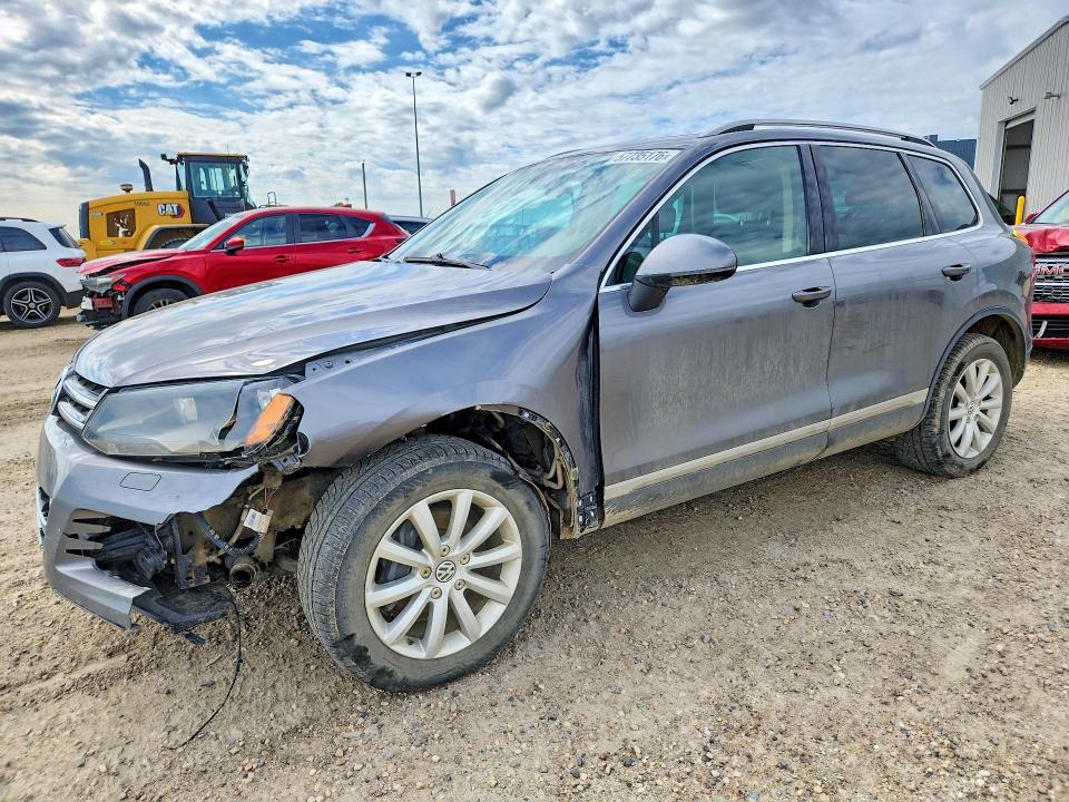 2011 Volkswagen Touareg VIN WVGFK9BP6BD002006 — COPART salvage auction photo