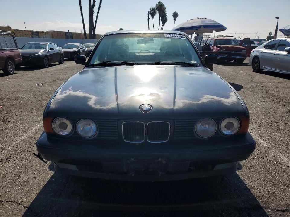 1994 BMW 5 series VIN WBAHD6320RGK43798 COPART salvage auction — NORMAL WEAR, CA - DIS/DLR/EXP ONLY CLEAN TITLE, sold $525 on 2026-07-30 (photo 5)