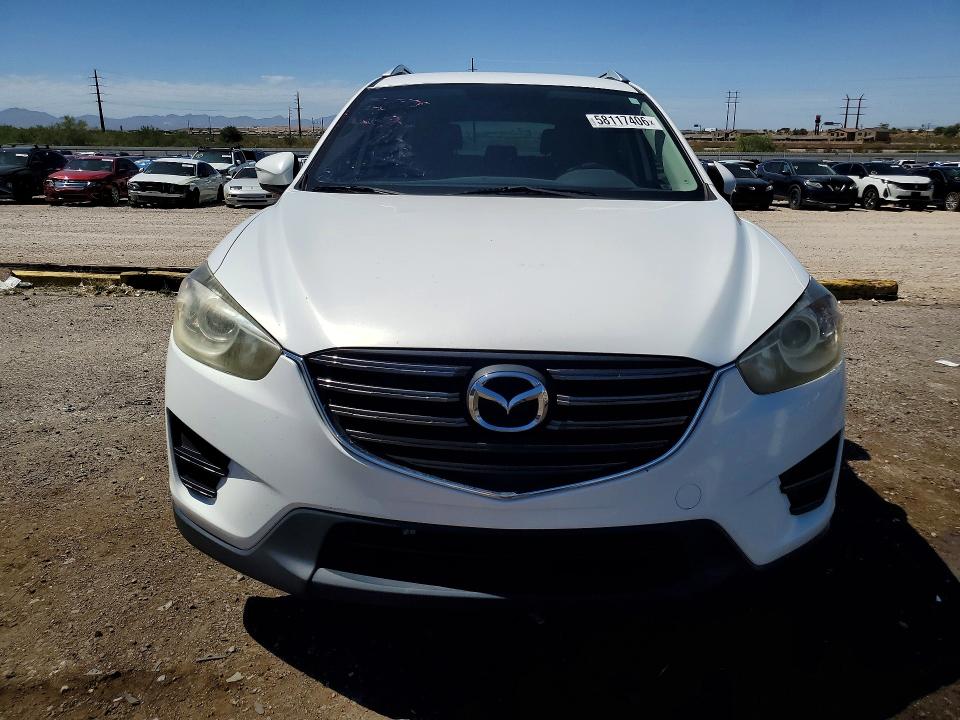 2016 Mazda VIN JM3KE2BY3G0684973 COPART salvage auction — SIDE, Az - Cert Of Title - Salvage, sold $2,350 on 2026-07-17 (photo 5)