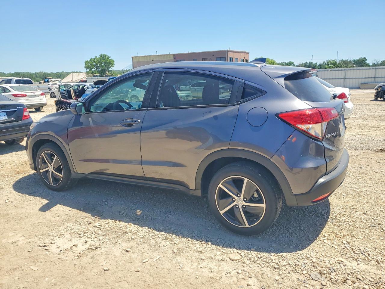 2022 Honda HR-V VIN 3CZRU5H50NM740834 COPART salvage auction — Side, KS - CERT OF TITLE-SALVAGE, sold $6,600 on 2026-07-09 (photo 2)