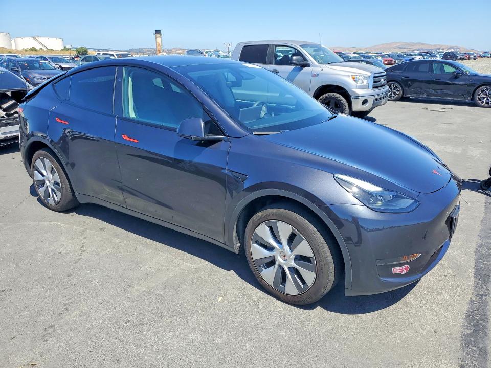 2024 Tesla Model y VIN 7SAYGDED6RF097322 COPART salvage auction — REAR END, CA - SALVAGE CERTIFICATE, sold $11,200 on 2026-07-13 (photo 4)