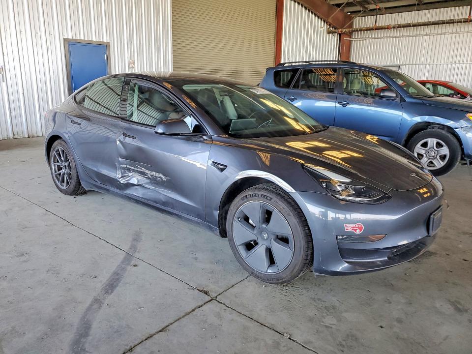 2023 Tesla Model 3 VIN 5YJ3E1EB1PF634234 COPART salvage auction — SIDE, Ca - Salvage Certificate, sold $5,500 on 2026-07-02 (photo 4)
