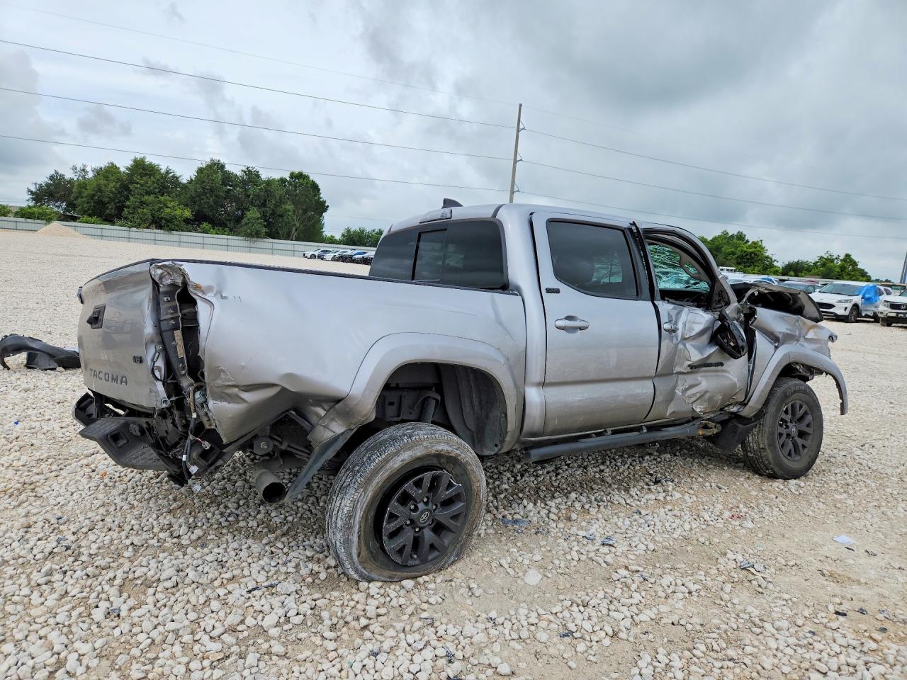 2020 Toyota Tacoma VIN 5TFAZ5CNXLX094317 COPART salvage auction — Side, TX - SALVAGE VEHICLE TITLE (P), sold $4,350 on 2026-07-02 (photo 3)