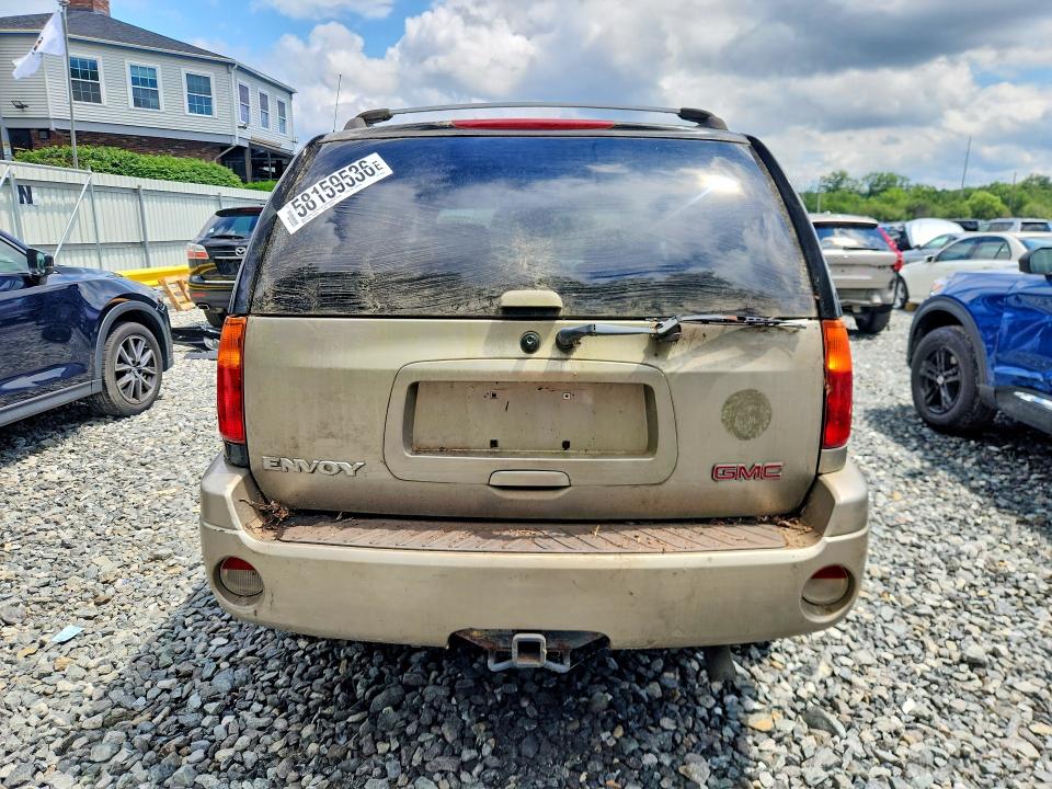 2002 Gmc Envoy VIN 1GKDT13S322106076 COPART salvage auction — MINOR DENT/SCRATCHES, Ma - Certificate Of Title, sold $400 on 2026-07-10 (photo 6)