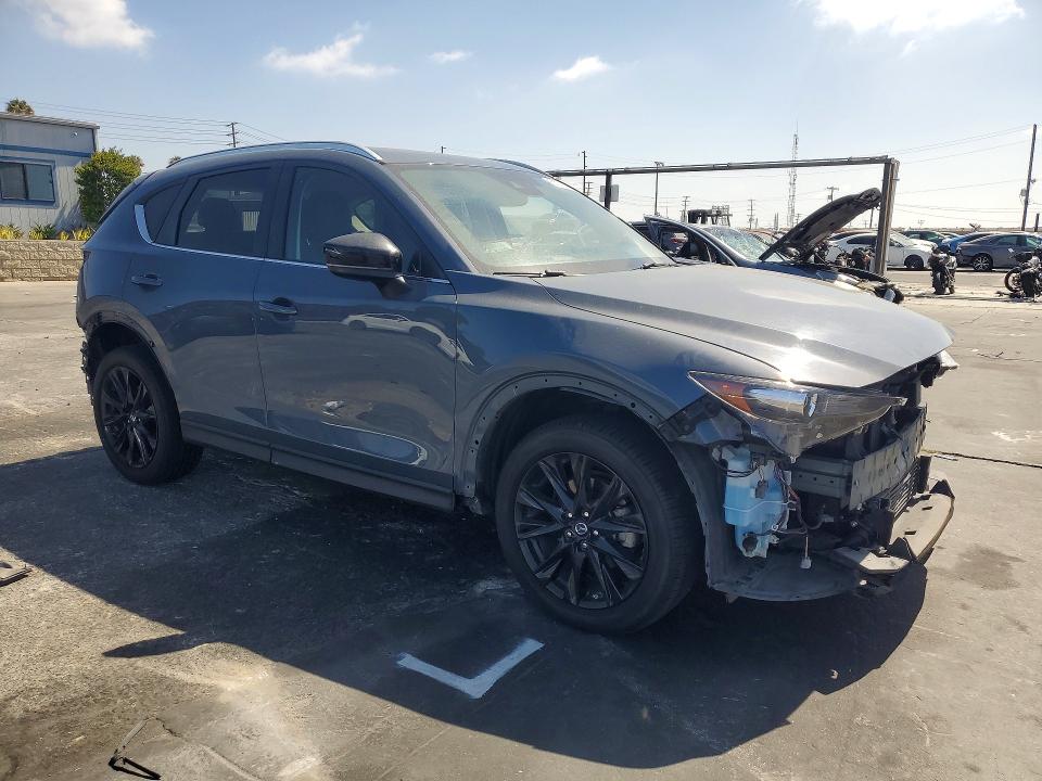 2021 Mazda VIN JM3KFBCY4M0409202 COPART salvage auction — REAR END, Ca - Salvage Certificate, sold $4,350 on 2026-07-29 (photo 4)